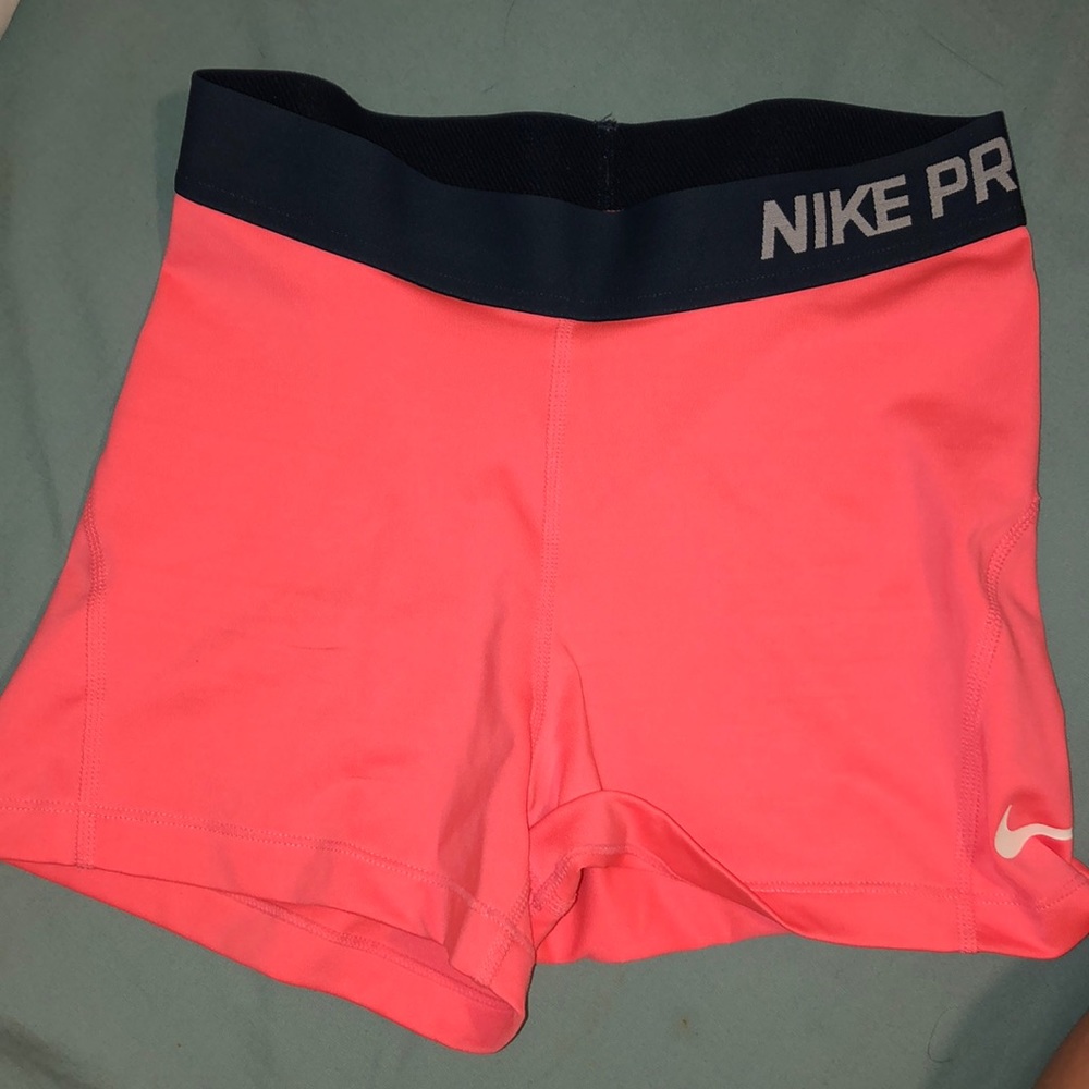 Peach Nike spandex shorts